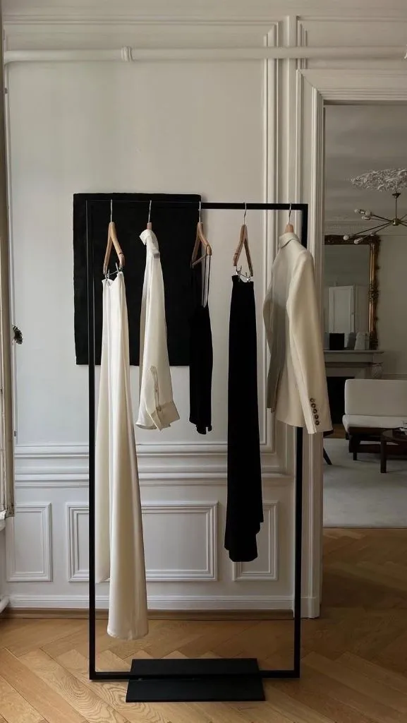 Curated capsule wardrobe on minimal rack
